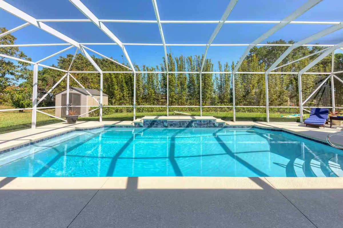 Beautiful Heated Pool Home: Waterfall, Games, and a Prime East-Side Location